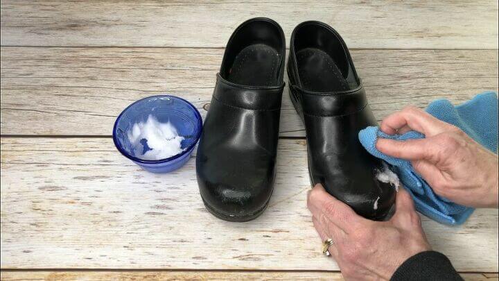 Scoop a little coconut oil on a microfiber cloth and wipe on your shoes. It will clean them, moisturize them, and make them weather resistant.