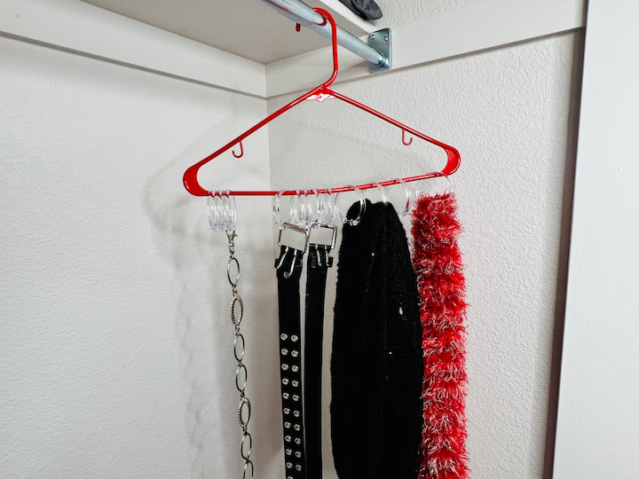 You can also use the same concept to store your scarves, simply thread them through and let them hang. This works well for decorative and winter scarves this also works great for belts. Just simply clip them onto the shower curtain rings. 