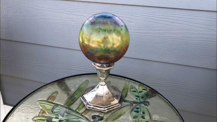7 Easy Garden Globes & Gazing Balls (6) rainbow glass ball on display