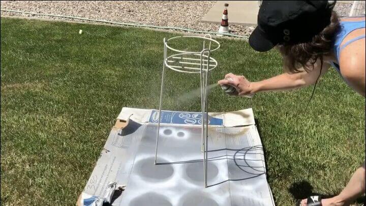 I found this plant stand on the side of the road for free! I took it home and spray painted it silver with Rustoleum spray paint and let that dry completely.