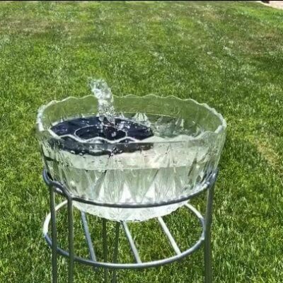 Here’s a picture of the fountain running. Be sure to refill the water as it evaporates. I also clean out the class and wash off the fountain as needed.