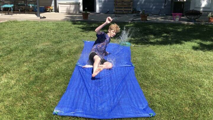 DIY's For the Best Summer Ever! (12) use a tarp to create a slip and slide