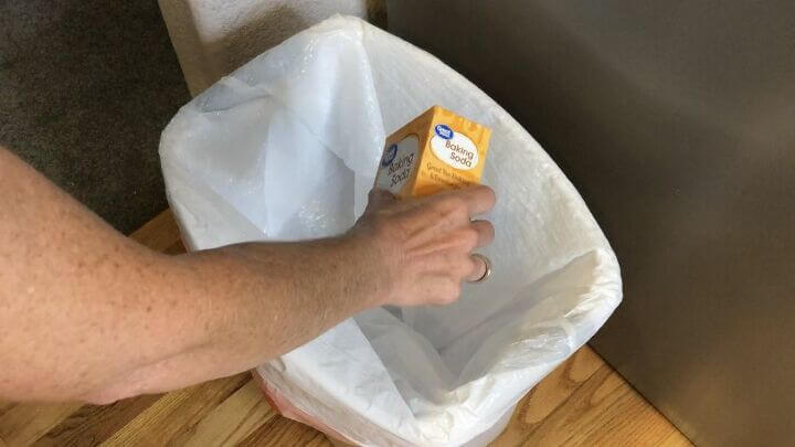 When putting a fresh bag in, add a little baking soda to the bottom to eat up those odors in your garbage can.