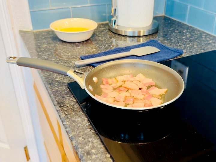 bacon cooking on the stove