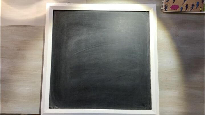 Here is the chalkboard and I seasoned it which means rubbing chalk all over it and then erasing it. That wasn't necessarily important for this particular project but if I wanted to use it later down the road as a chalkboard this is an important step so that the chalk erases.