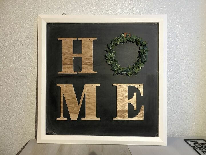I love the Target Dollar Section and I found a chalkboard and a "Home" garland for just a couple dollars. I turned them into a trendy home sign!