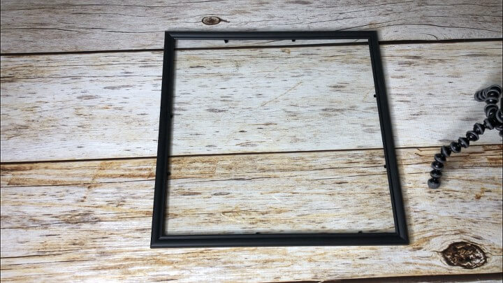 I pulled the back off a picture frame I had on hand.
