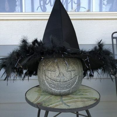 I placed a witch hat on it and put it on display. I think it looks like faux concrete.