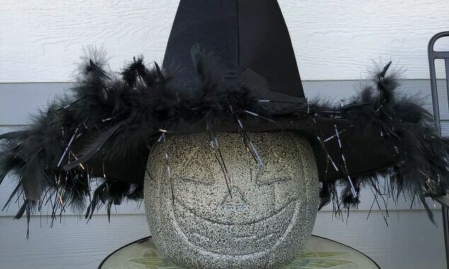 I placed a witch hat on it and put it on display. I think it looks like faux concrete.