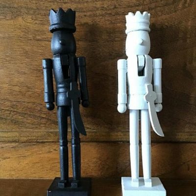 I used Folk Art Home Decor Chalk paint that I had on hand in the colors black and white. I painted each of the Nutcrackers with 2 coats of paint and let them dry between each coat. After the last coat, I let them dry completely.