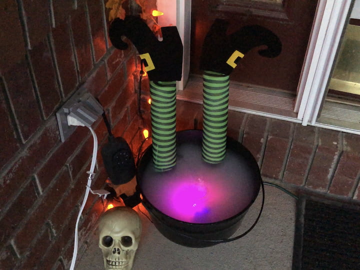 Your witches cauldron looks great by day and glows at night!