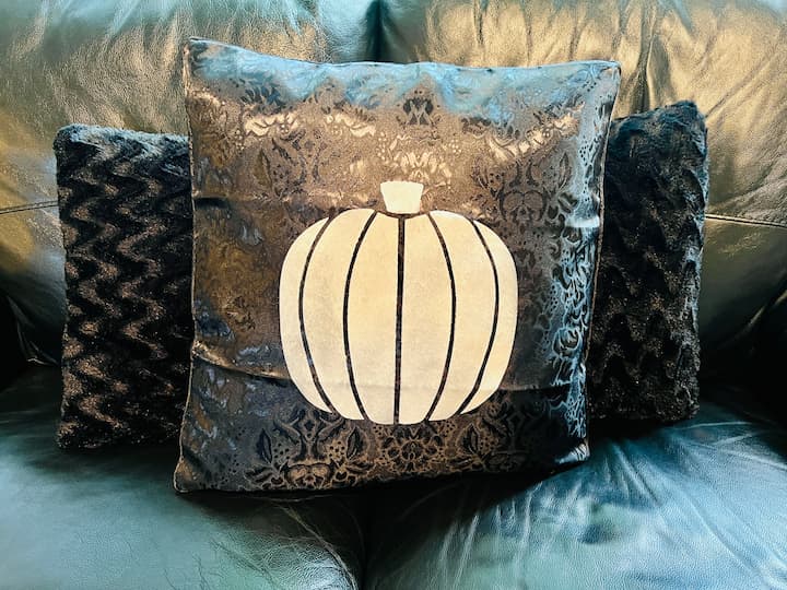 For this project I used a pillow cover, stencil, and paint. Such an easy DIY pumpkin pillow!