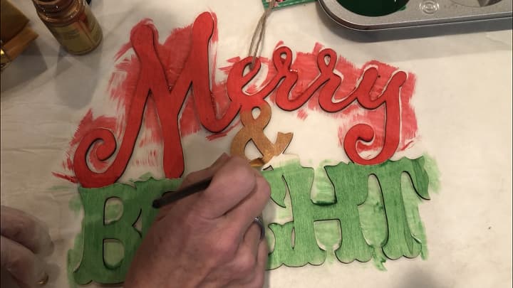 For the first Merry & Bright sign - I used Folk Art Ultra Dye in the colors Infra Red and Emerald City. I painted the "&" with Folk Art Ultra Gold in the color copper. Once this was painted I let it dry completely.