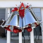 I hot glued some red ribbon on the top so that I could hang the silver bells outside on a hook.