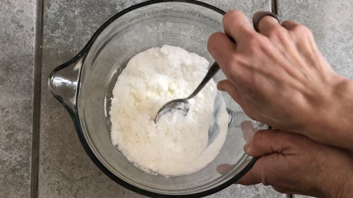 Toilet Cleaning Bombs - Mix together 1/2 cup baking soda and 1/2 cup citric acid. Add a teaspoon of lemon juice and mix together. Add a small amount of water and mix until you can make the mixture stick together.