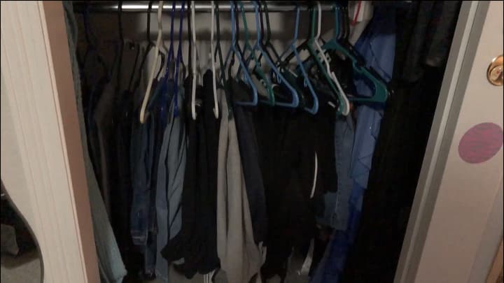 The other side of the closet has 2 hanging racks in it. We put shirts on top, pants on bottom. Now she can see more of her clothes, and get to everything without the mountain falling on her.