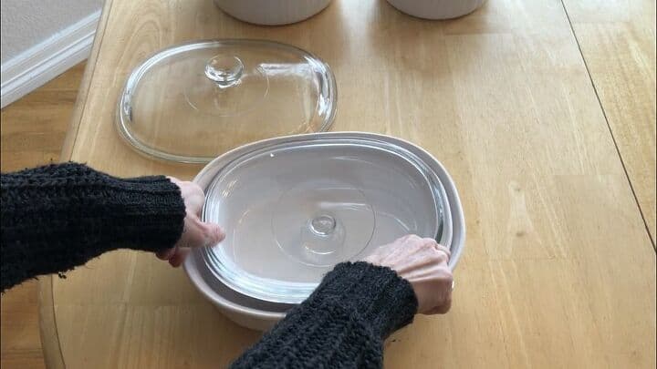 I put the smaller lid upside down inside, on top of the small dish.