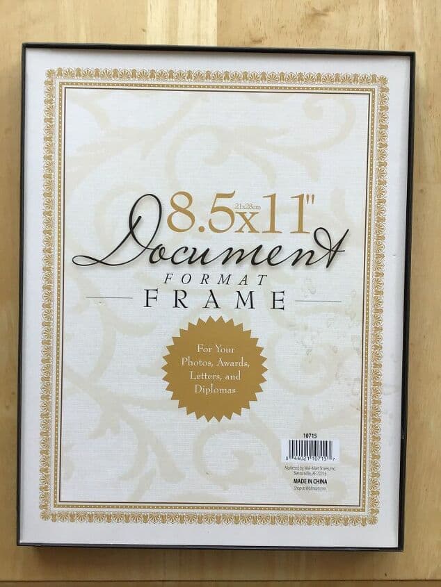 Grab a picture frame that holds a regular sheet of paper. Or you can cut your printable to size.
