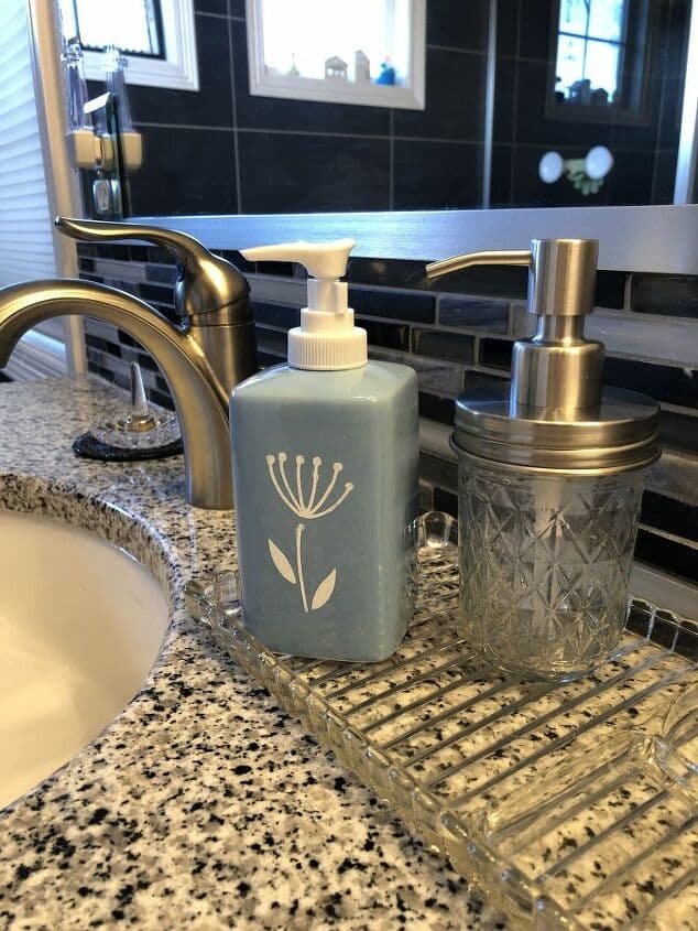 I bought a couple dollar store soap dispensers and they were kind of plain so I decided to upcycle them with stencils. I also had a couple recycled mason jars that I upcycled into soap dispensers.