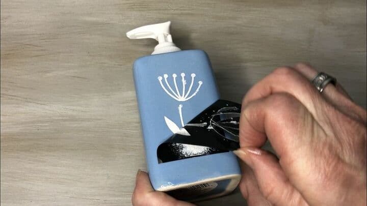 Peel off your stencil as soon as you have the desired amount of paint. Many of these stencils are reusable, simply clean it and put it back onto it's backing. Let it dry completely. It's important to read the back of your paint for cure times before use. Now onto the second dispenser...