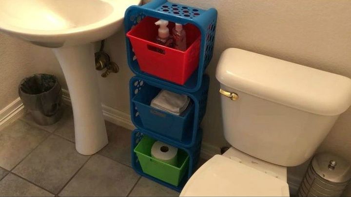 Add some dollar store bins inside your shelf and you have some extra storage where you might need it. This is an example of bathroom storage but you could also fill the baskets with toys and use it as toy, bedroom, craft storage, etc.