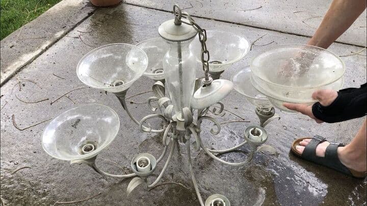 Here's the first chandelier.  I started by removing the light bulbs and the glass fixture pieces.