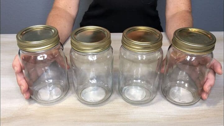 I grabbed 4 mason jars from the dollar store. You can use recycled jars if you like. I wanted them to be smooth on all surfaces.