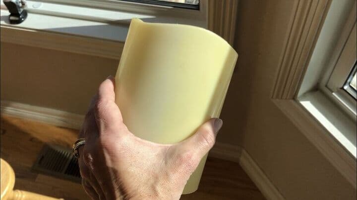 The candle inside was turning yellow and was discolored from being exposed to the sun.