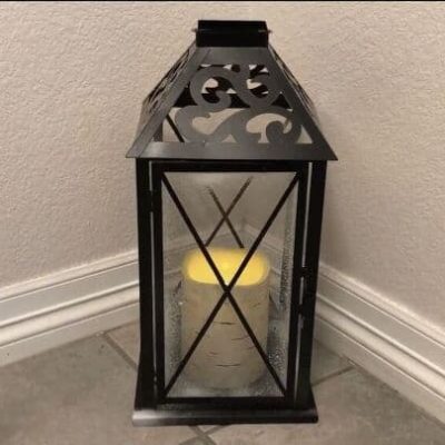 I found this old lantern at a thrift store, and with a little love I turned I revamped it. I also found a way to change it up every season with a fun new twist. I'll show you how I updated this lantern and it's yellowing candle.