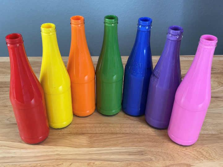Let them dry: Once the bottles are coated with paint, let them dry completely. The colors will appear vibrant and appealing.