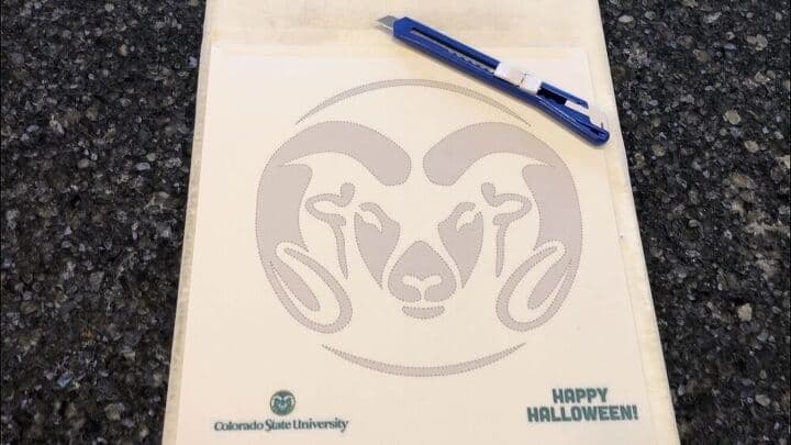 I went online looking for something that would help me stencil this table with Colorado State University. I found this Halloween pumpkin carving of Cam the Ram. I printed it out on card stock, and cut out the shaded areas.