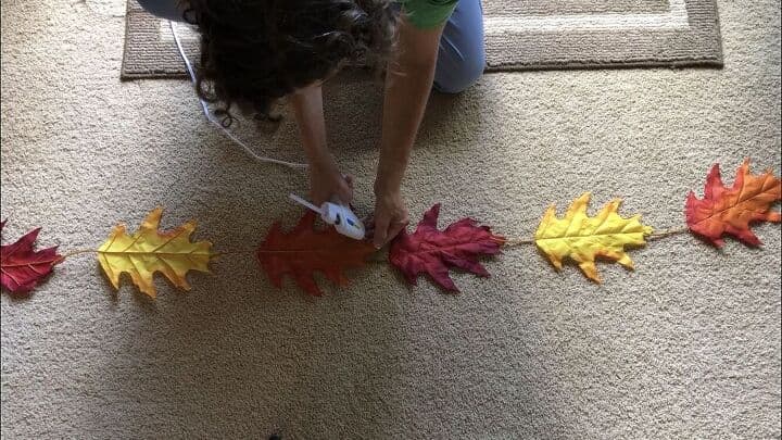 For my second project I hot glued the fall oak leaves together in a line.