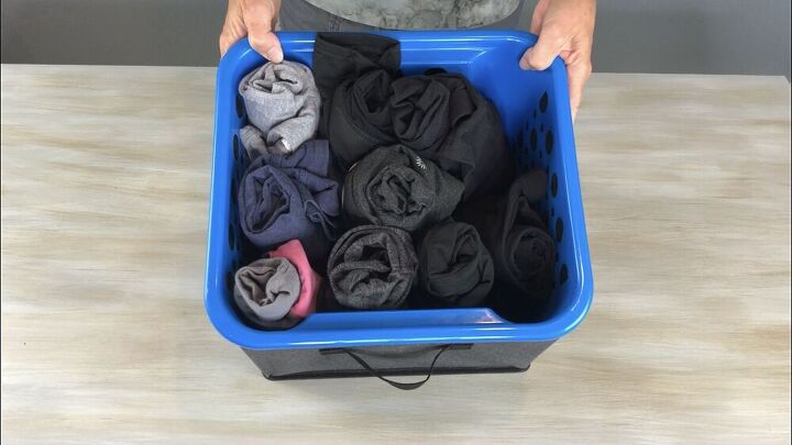 I roll all of my leggings up and place them in a storage box. This works great for young kid's pants as well.