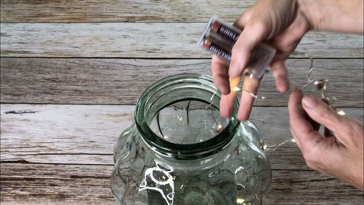 I added the batteries and placed the strand of lights into the glass jar.