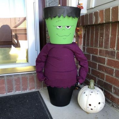 Do you want to know how to make Halloween Decorations? Many of you have seen my flower pot creations, my scarecrow, snowman, Santa, & Uncle Sam. I'm at it again creating a flower pot Frankenstein (or Frankenstein planter). Today I'm sharing how I made my Halloween Frankenstein Candy Holder.