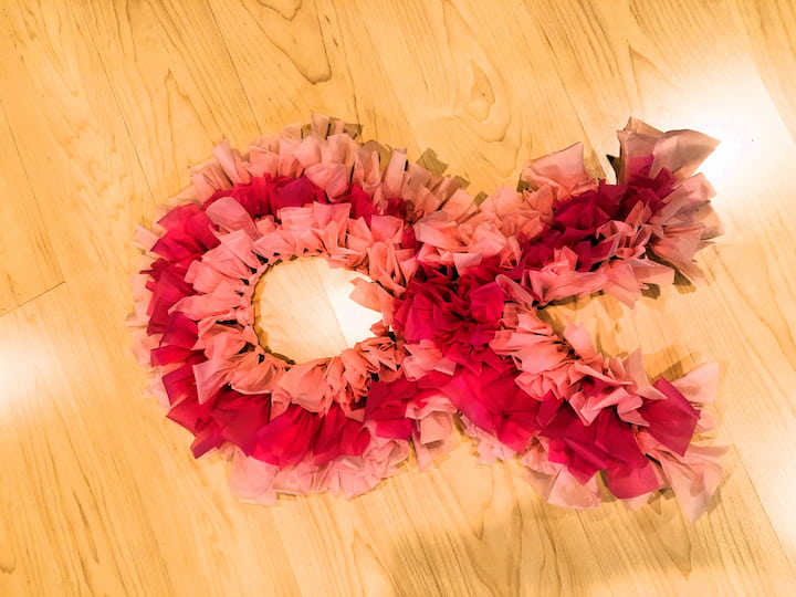 Continue looping until the entire wreath form is covered.
