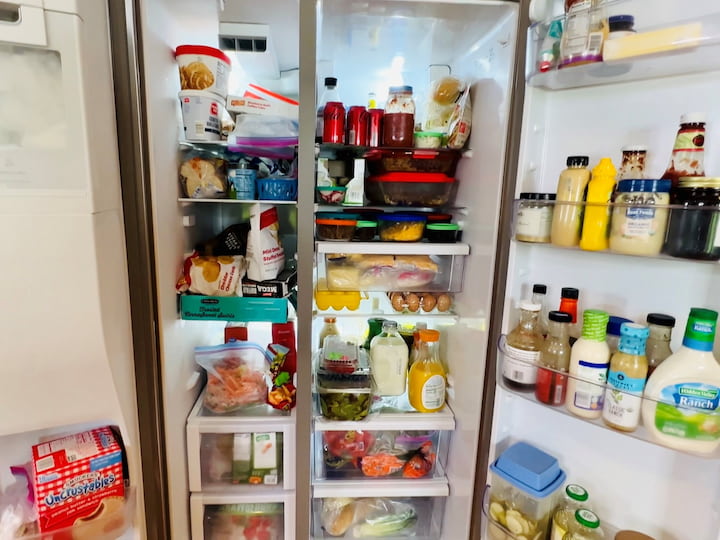 Empty refrigerator and freezer compartments. Wash drawers and shelves in soapy water, dry, and reassemble. Clean the interior of the fridge and freezer, organize items, and discard expired items.