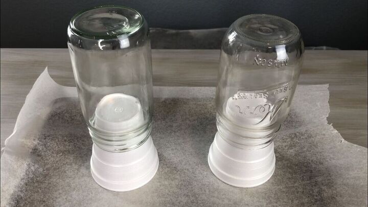 For the first 2 mason jars, I placed them upside down on a styrofoam cup, and place that on top of wax paper on a baking sheet.