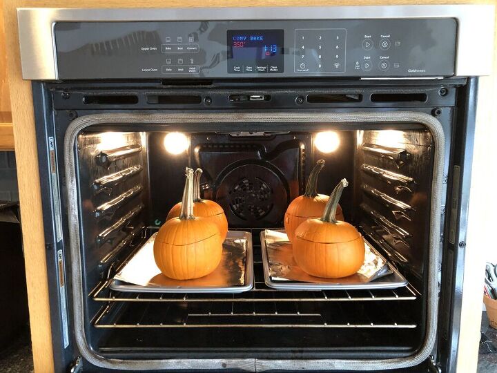 Place the lids back on the pumpkin, and place the pumpkin on a foil lined baking sheet.