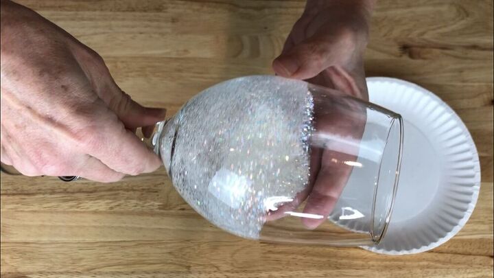 I added white glitter and spun the glass around so that the glitter stuck to the floor cleaner.  I dumped out the extra glitter.