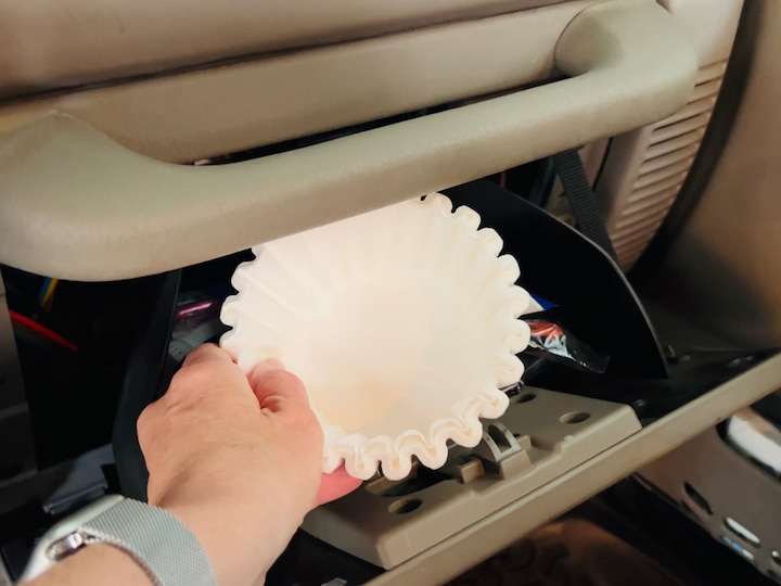 I like to keep coffee filters in my car because they can help with so many things!  