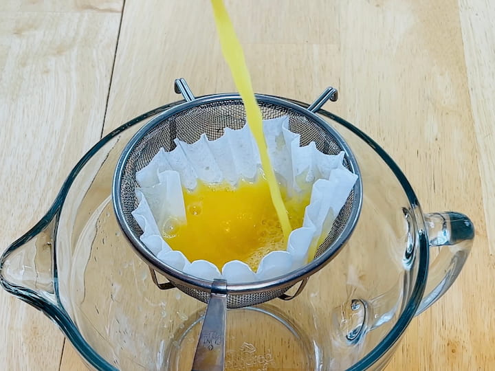 straining liquid with a coffee filter