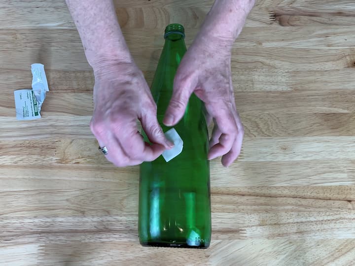 I washed my bottle and then removed the label. After the bottle was dry, I used rubbing alcohol to clean the bottle to make sure there wouldn't be any oil, dirt, or debris on it.