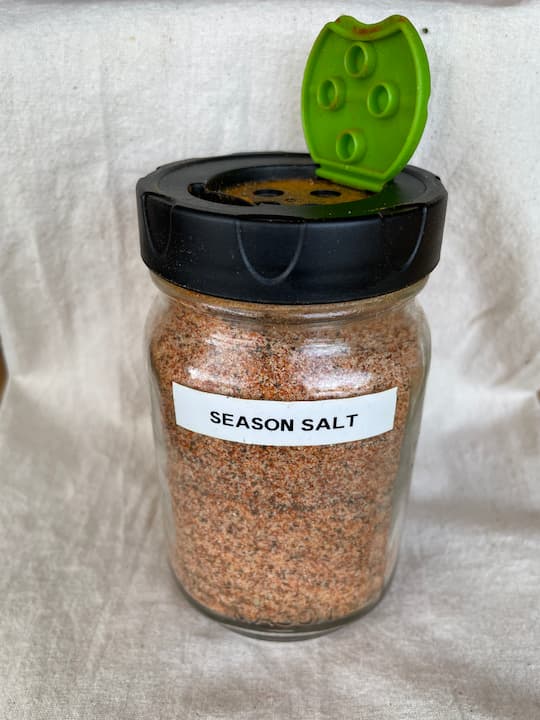 Place the lid on. I love these Ball seasoning lids. I used my label maker to create a label for my season all salt.
