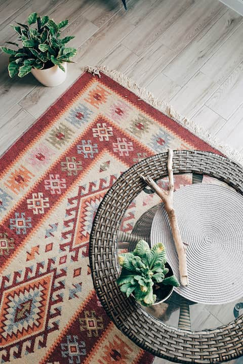 If you don’t have a great deal of experience in room renovations, you can get your rug selection quite badly wrong. Many people are in the habit of choosing small, puny rugs. But these have the effect of making rooms feel fragmented, disjointed, and claustrophobic. 