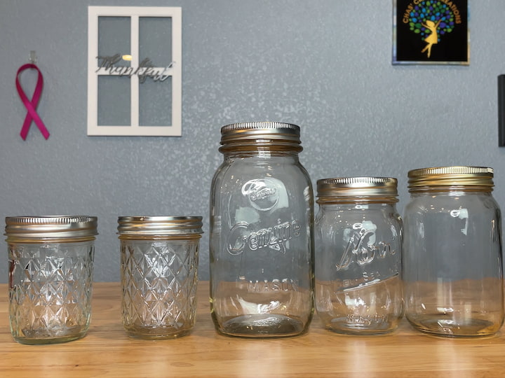 For all of these projects, you can use a Dollar Tree glass jar, or you can use Mason or Kerr jars, or even recycled jars.  You can use small, medium, and large jars for gifts.  You can even find some of these glass jars at thrift stores.  