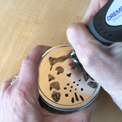 4. use your Dremel engraver to trace the design