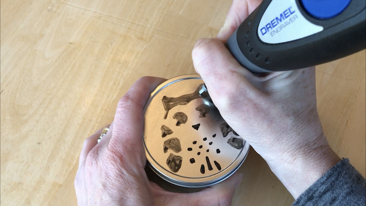 4.  use your Dremel engraver to trace the design