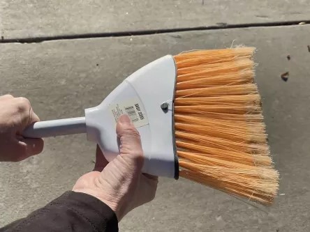2. Remove the broom from the handle