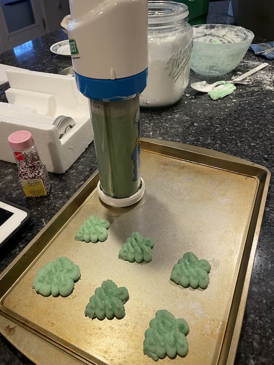 Place the soft peppermint mixture into your Electric or Manual Cookie Press.